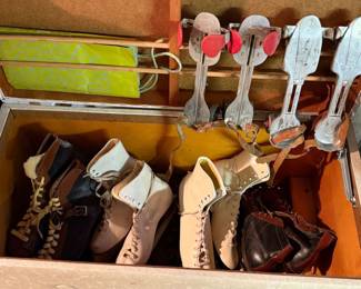 Vintage rollerskates and ice skate