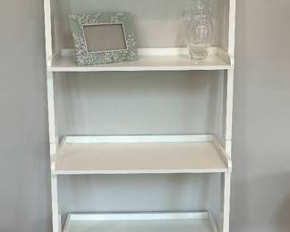 White ladder shelf unit