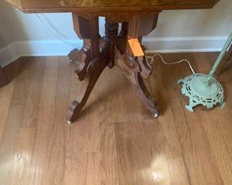Vintage small wood table on rollers