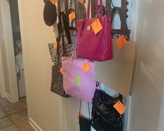 Handbags on wall hanger