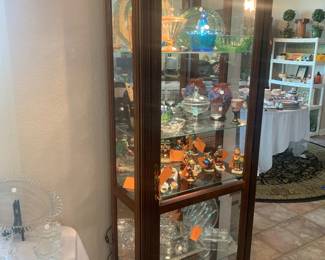 Small lighted curio cabinet