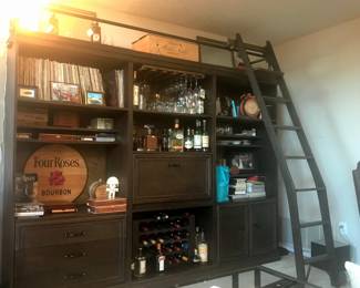 Three bookcases with a ladder OR they can be purchased one by one.