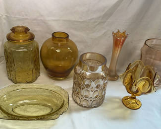 Lot 189: Assorted vintage amber and pink glassware: vases, jars, and plate