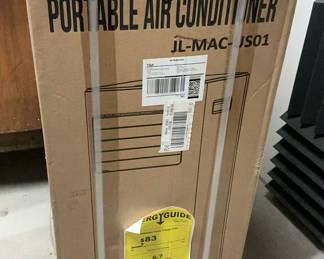 Lot 55: New Portable Air Conditioner still in box