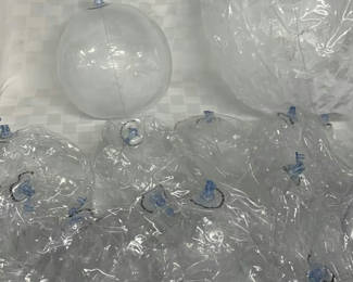Lot 95: Clear Beach Balls And Barbie Raft