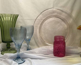 Lot 300: Green hurricane vase, blue ribbed goblets, pink textured jar, amber vase with red rim, and silver plate