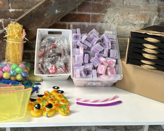 Lot 297: Assorted craft supplies, party favors, and packaging items