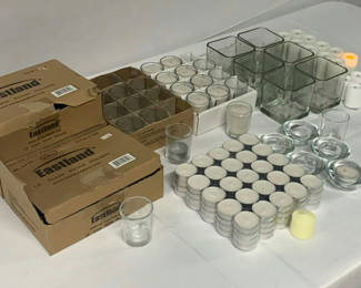 Lot 150: Clear Glass Votive Holders And Candles