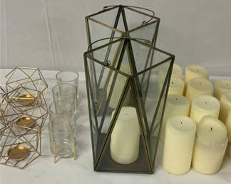 Lot 151: Copper And Brass Toned Candle Holders And Candles