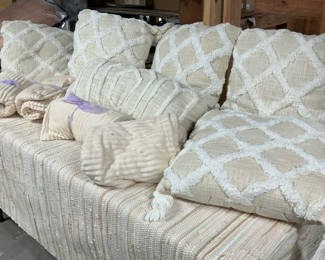 Lot 118: Beige decorative pillows and matching throws