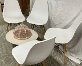 Lot 16: 4 White Plastic Eiffel Chairs, Round Low Table