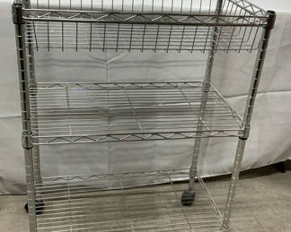 Lot 25: Stainless Steel Rolling Shelf