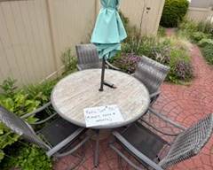 6 piece outdoor patio set including table, 4 chairs and umbrella with base