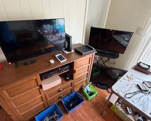 TVs, DVD & CD players, VHS player, cords and extensions, telephones