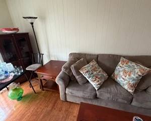 couch, end-table, chair, cabinet, lamp, glassware