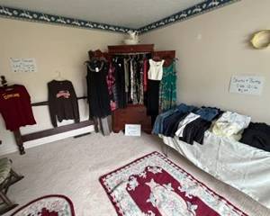Large Amour, women's clothing + a full walk in closet full of hung and clean clothes