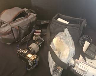 Minolta 7000 With Bag, Flash And A Panasonic Progressive 700x Digital Zoom Palmcorder
