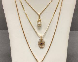 Three 14k Gold Necklaces Pearl, Maple Leaf and Cross with sea pearls and sapphire pendants 8.85 Total Grams 16 inches