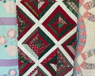 Quilts. Left is a twin; right is a full; middle is a king