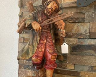 Carved Musician 