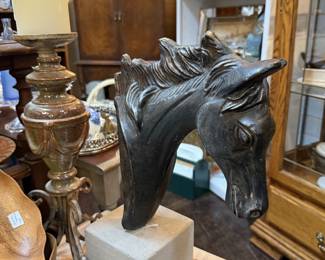 horse head statue, candlesticks, colored brass bottles