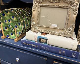 frames, peacock dishes, coffee table books
