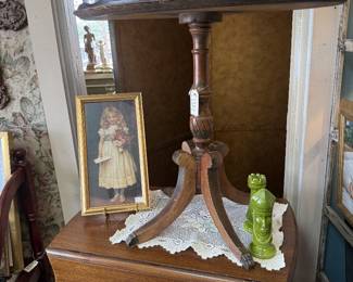 vintage table, framed art, books