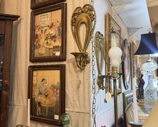 pretty sconces, vintage framed art, table lamp