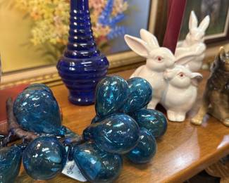 bunny candlesticks, blue vase, glass grapes