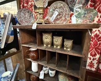 brass owls, dishes, shelf