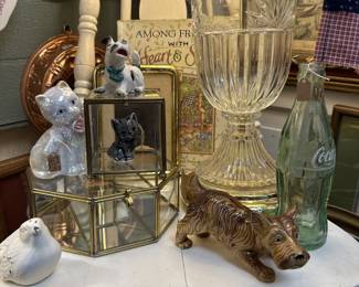 lamps, coke bottle, dog figurine, cat, plates, vintage white chair