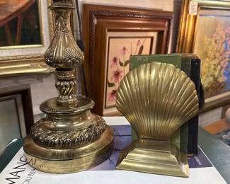 brass book ends, large pillar candle holder, framed floral oils