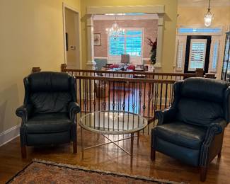 2 blue leather recliners available 