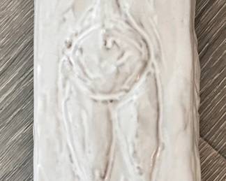 Ceramic embossed figurative vase