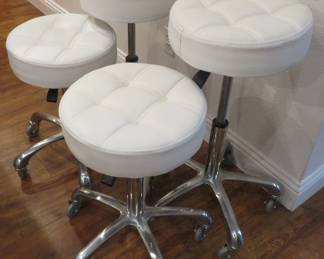 Adjustable rolling stools