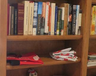 Brass bookends, books