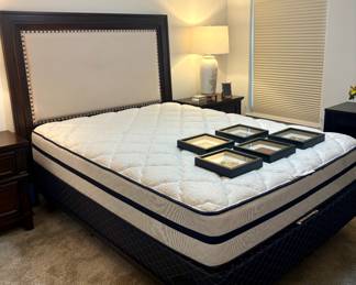 Queen bed with padded headboard