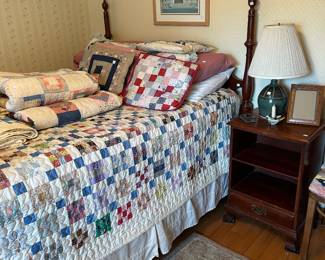 Quilts, full bed, bedside table
