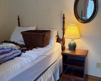 Full bed, side table, wall mirror