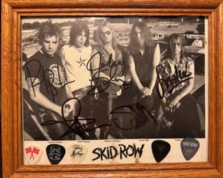 Framed Photograph with Guitar Picks of the Band Skid Row Autographed by Members - Rachel Bolan, Phil Varone, Johnny Solinger, Scotti Hill & Dave "The Snake" Sabo
