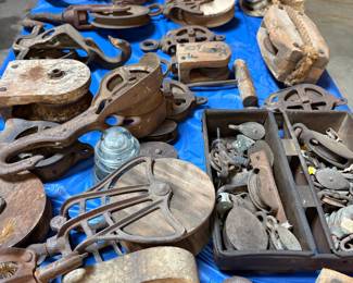 Assorted Vintage Cast Iron and Wood Pulleys, Including Hay Trolley Parts