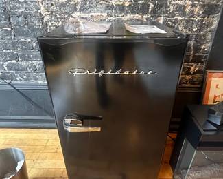 Brand new out of box retro Fridgedaire mini-fridge with documents 