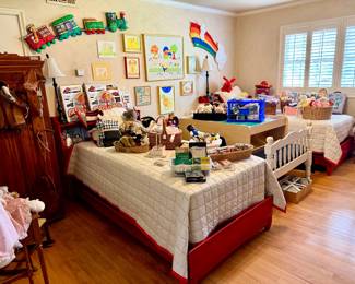 Kid's room with lots of vintage wall decor and games.