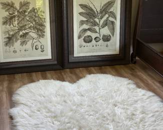 A pair of botanical prints , framed. Chanasya faux sheepskin rug 
