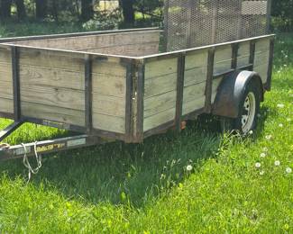 Landscape utility trailer 6' x 10' , wooden side panels, rear  mesh ramp/gate 