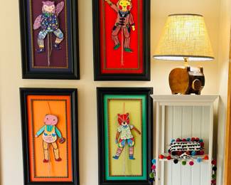 Puppets from the MET hand framed by Angela Hoover 