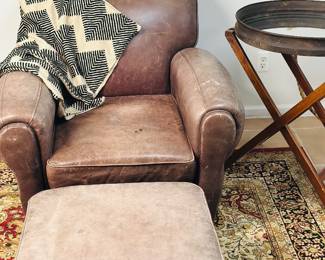 Leather chair with ottoman, Silk Road area rug, 8' x 10' 