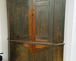 Primitive painted corner cupboard 