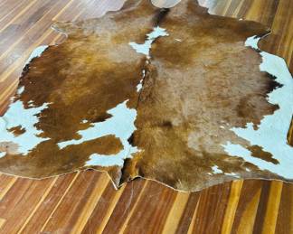 Brown & White Brazilian cowhide rug 80" L x 70" at widest point 