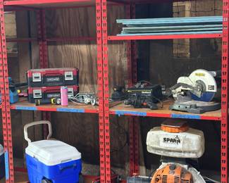 Stihl SR 450(430) backpack sprayer or mist blower , several red metal shelving racks , coolers, tool boxes 